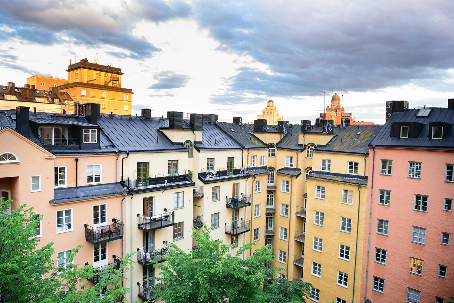 Block of flats in city under cloudy sky