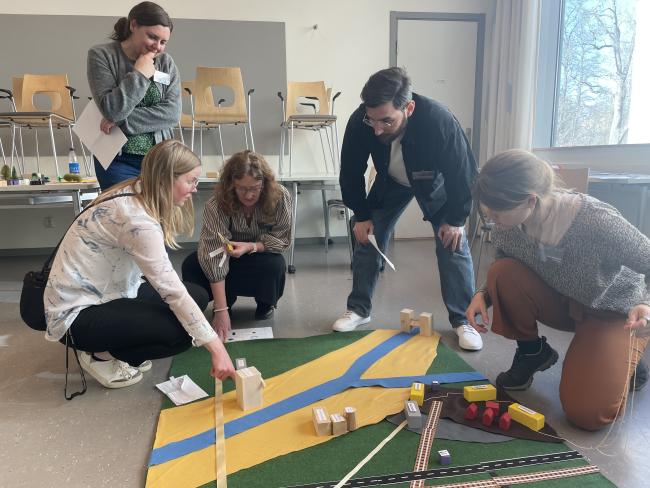 Fem personer som spelar Energiköping.