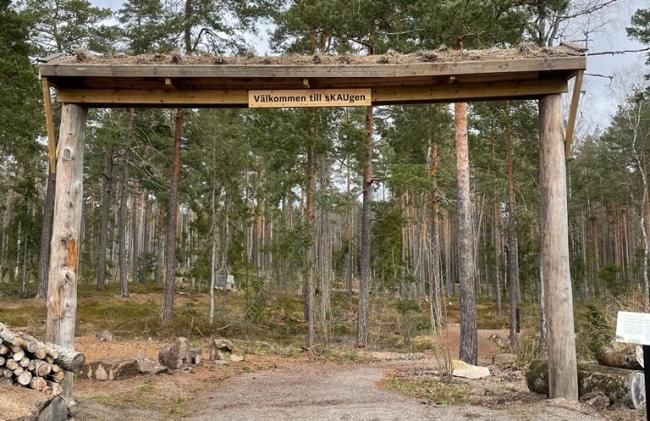 Skylten till promenadslingan sKAUgen
