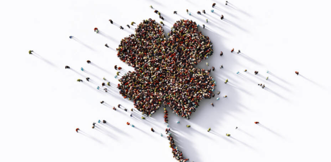 People gathers in the shape of a four-leaf clover